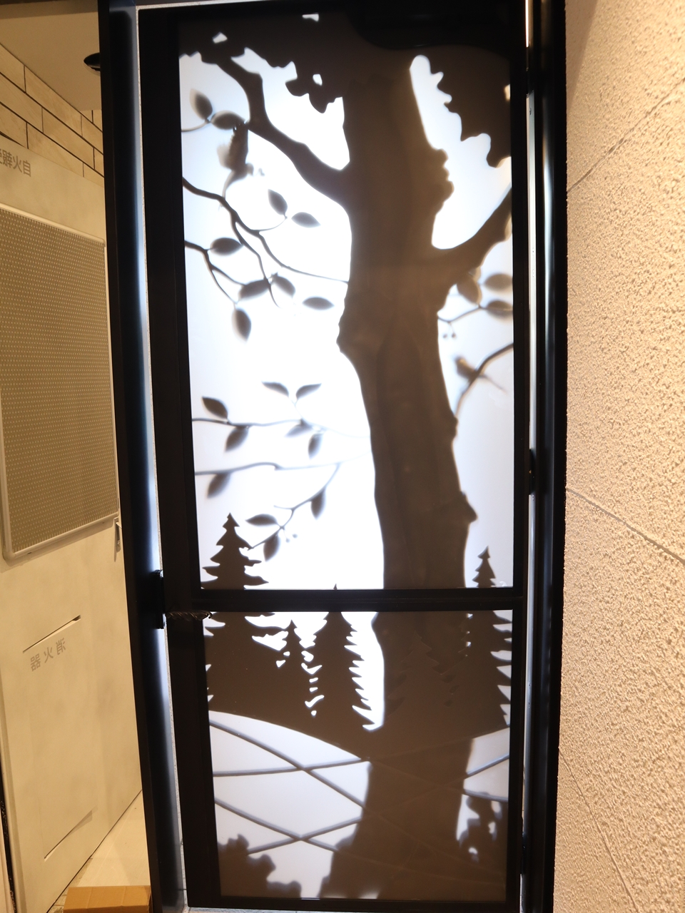 ロートアイアンのマンション扉【森】